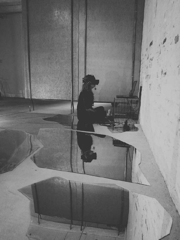 Visitor sitting in the Ground Control exhibition